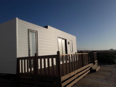 Chalet avec terasse et vue mer